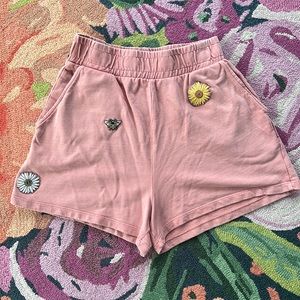 Zara high waisted shorts adorned with flower, bee, and leaf patches